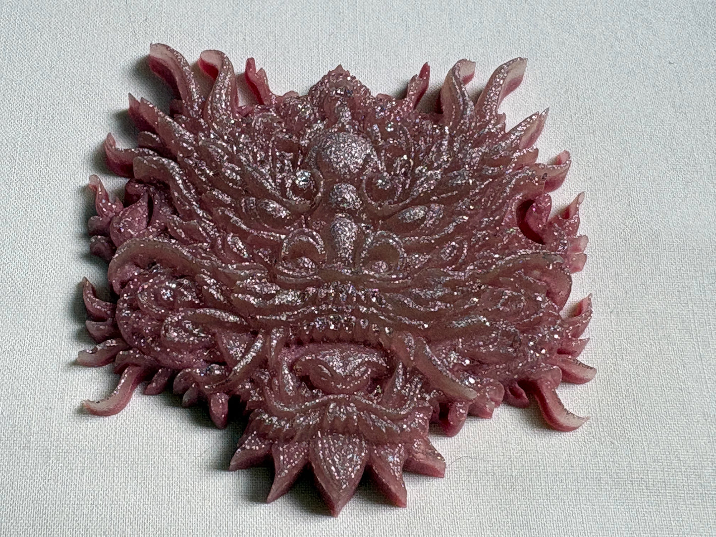 Pink dragon, amulet