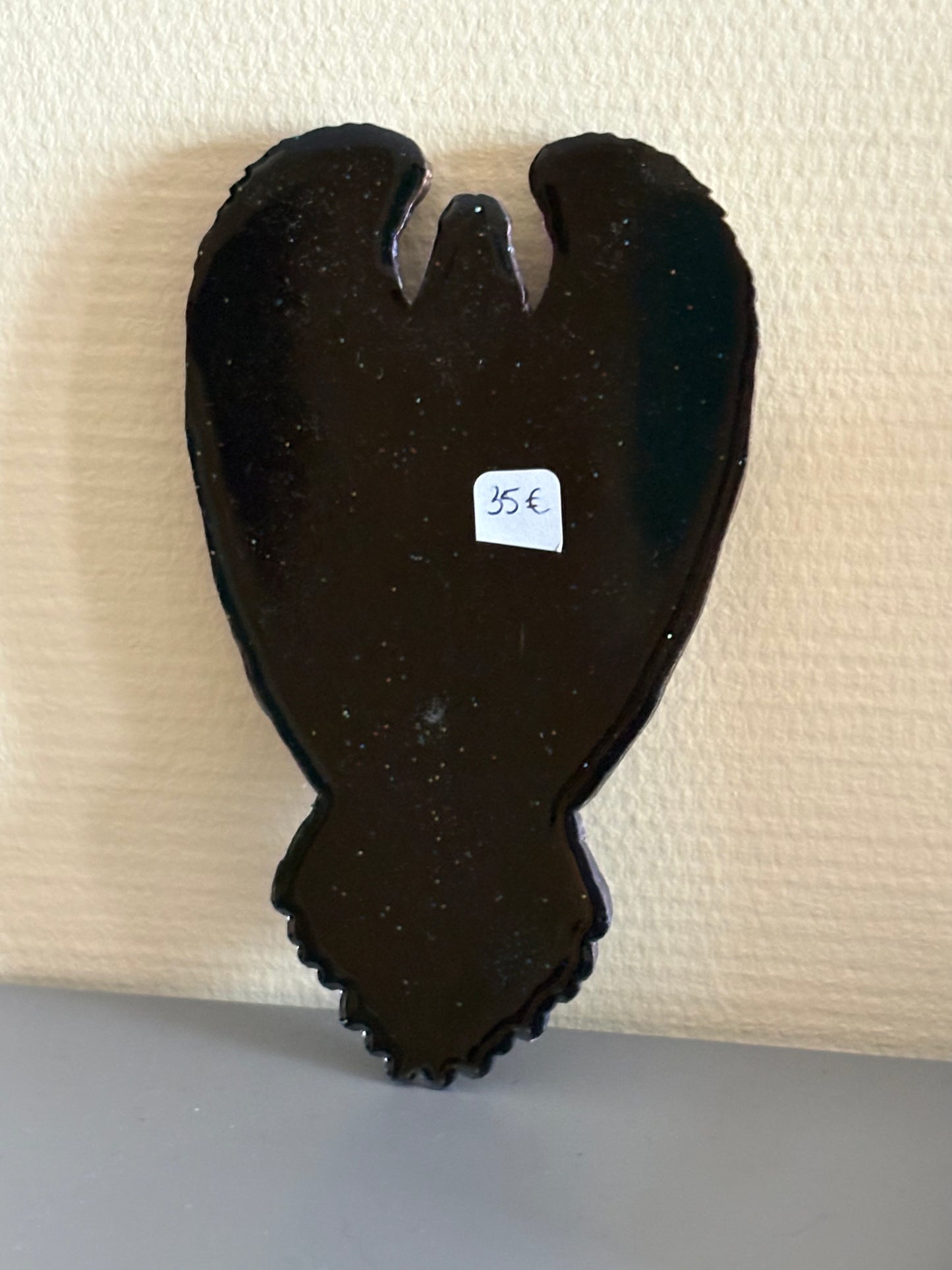 Gevleugeld koppel amulet