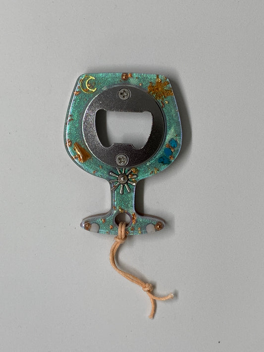 Flessenopener, zon en maan