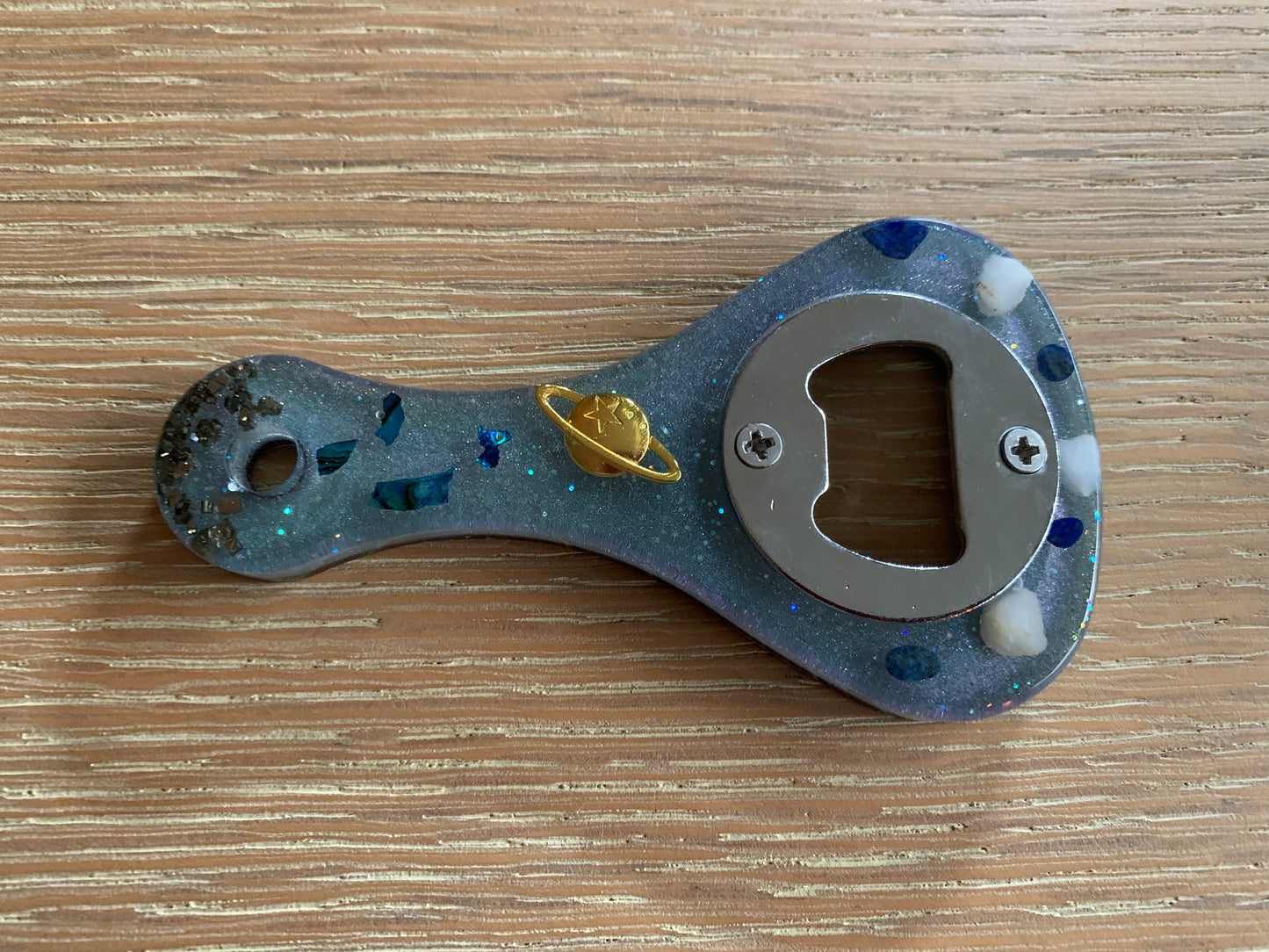 Flessenopener, kosmos goud