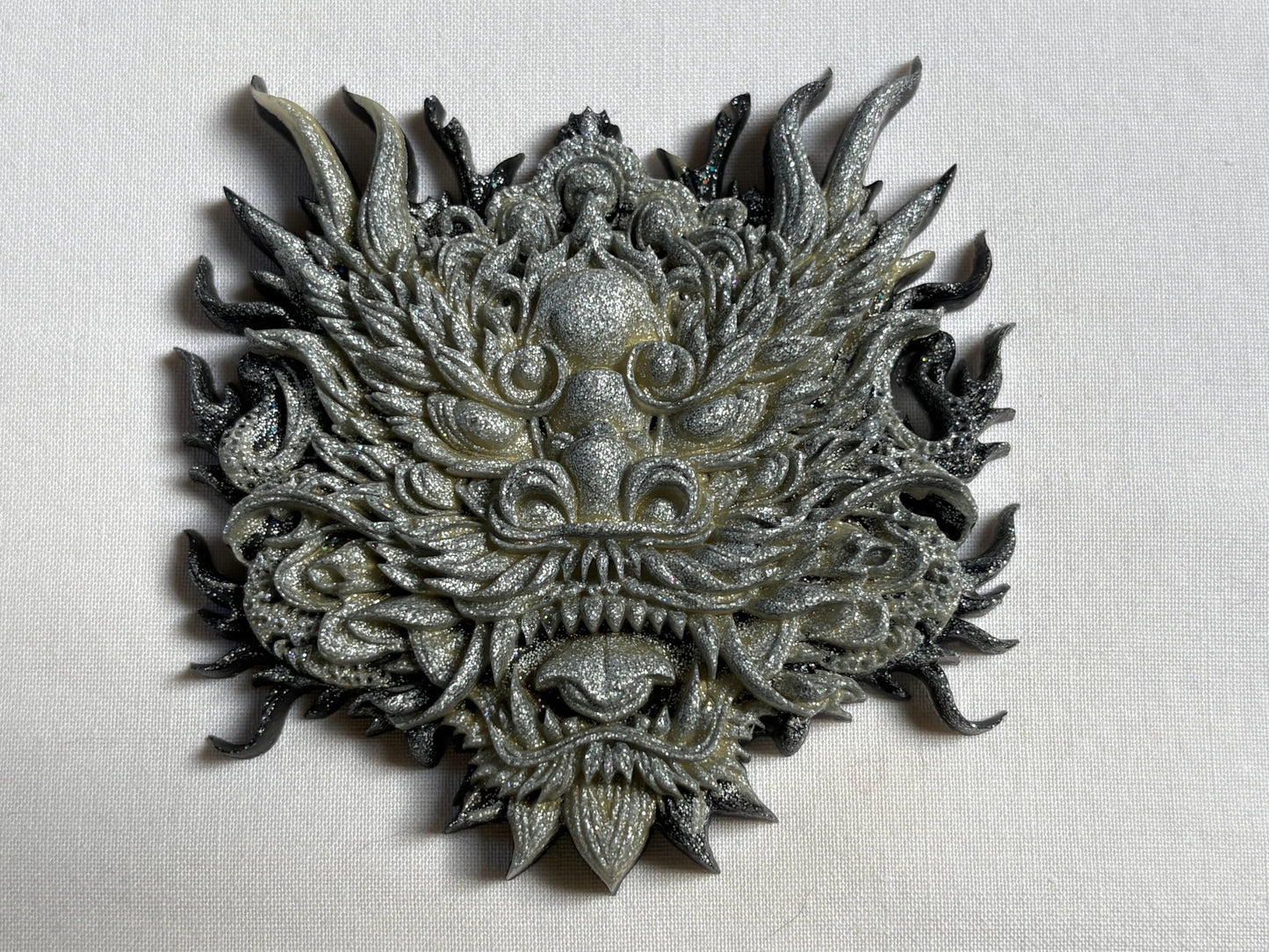 Silver dragon, amulet