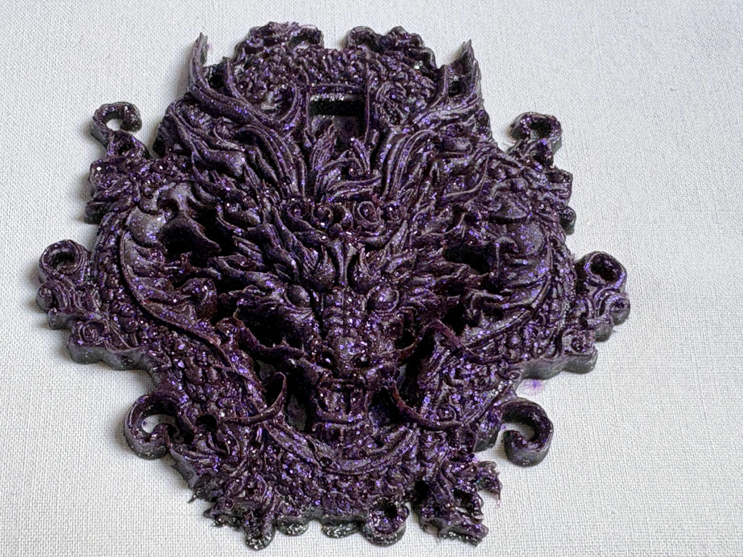 Violet dragon, amulet