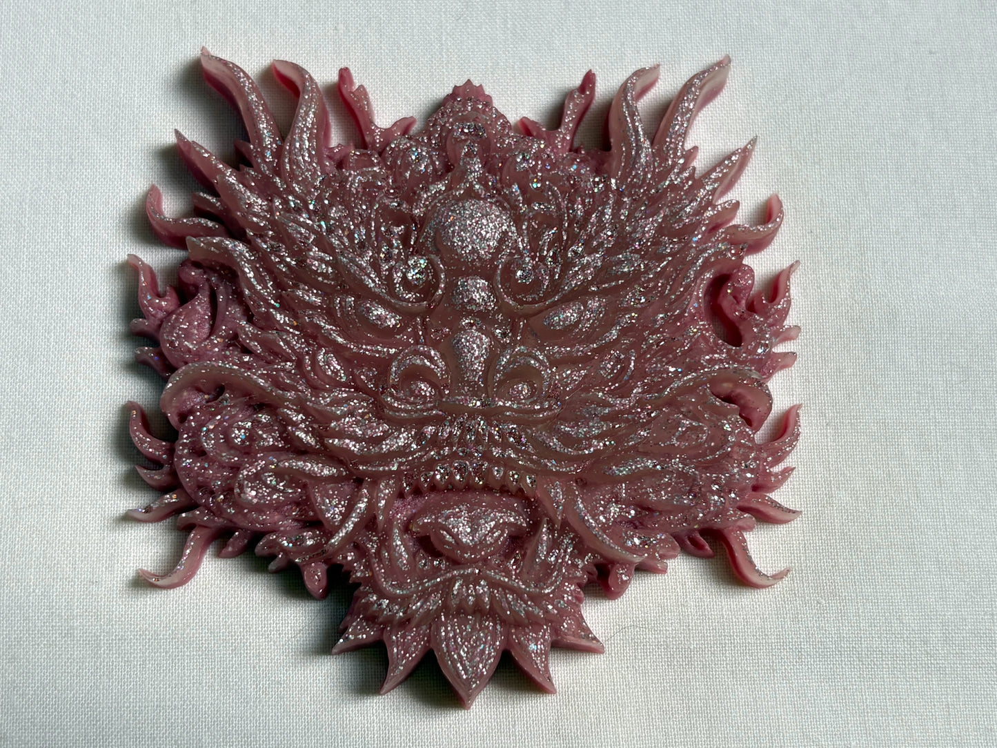Pink dragon, amulet