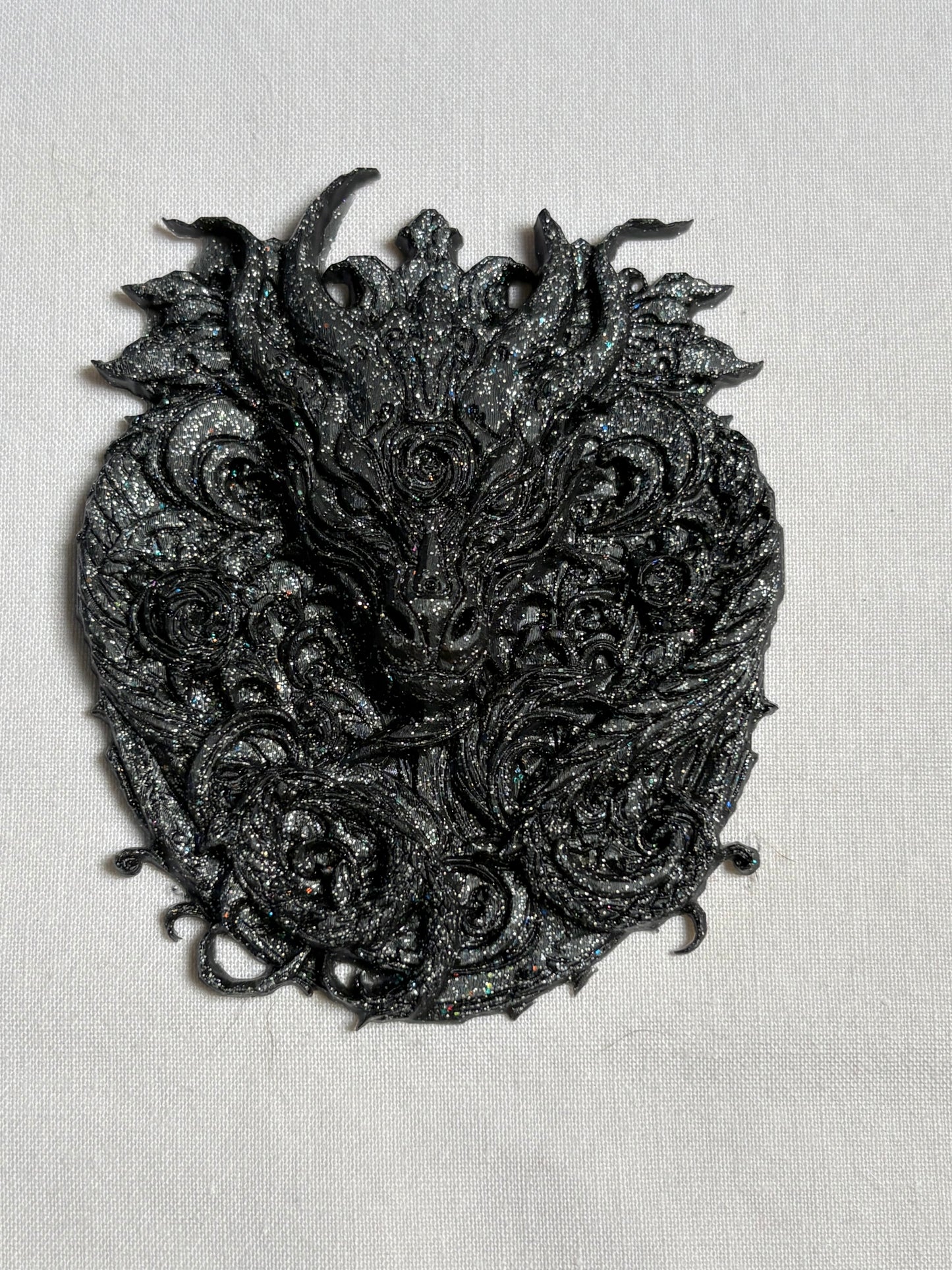 black-grey dragon, amulet